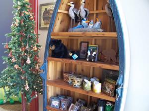 Toys on canoe shelf gift shop